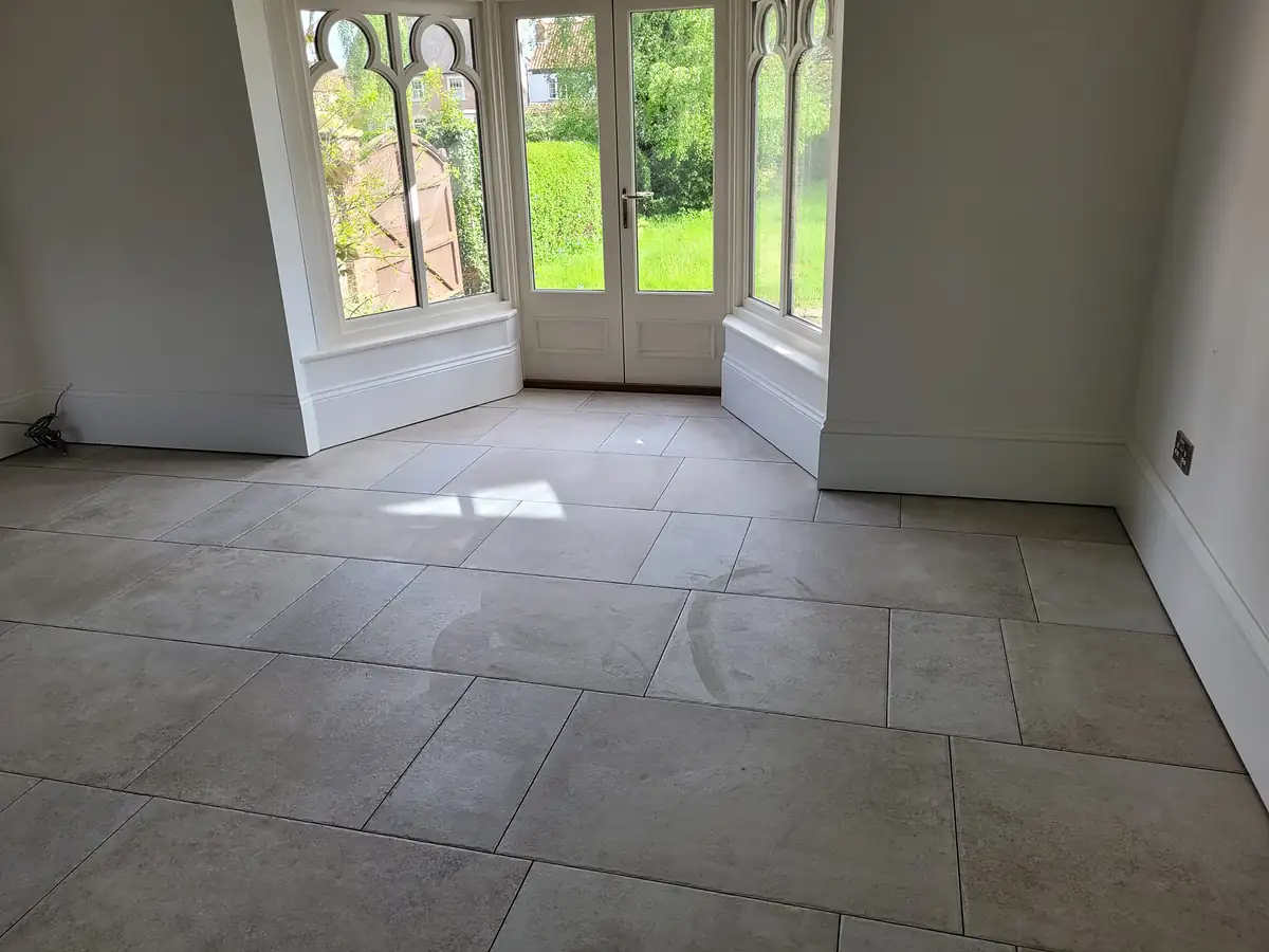 Bay window room with stone floor