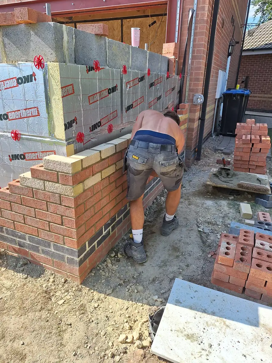 Blockwork and insulation going up