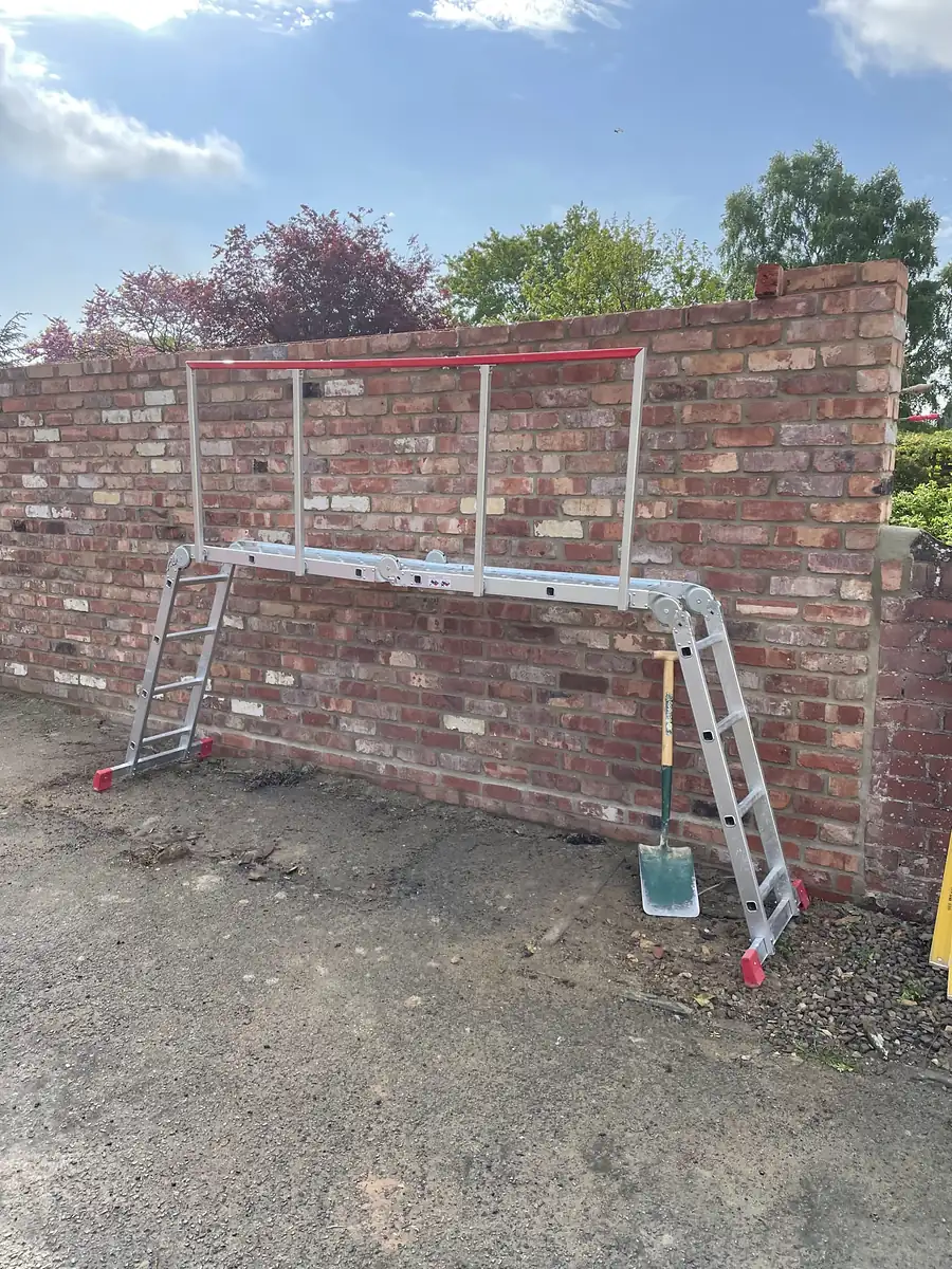 Brick garden wall going up