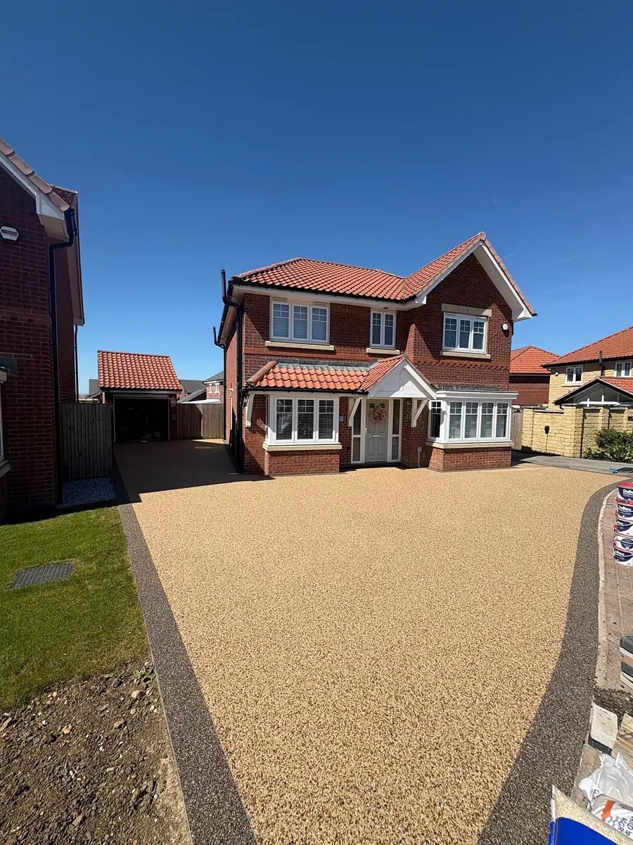 Buff resin driveway at a new build