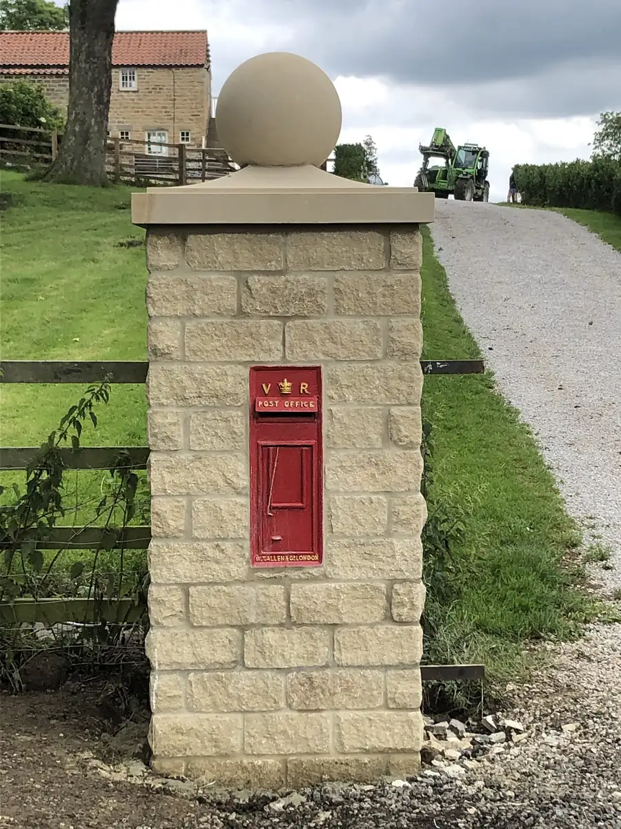Stone pier with a post box