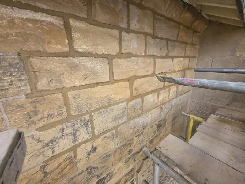 Sandstone wall repointed in lime