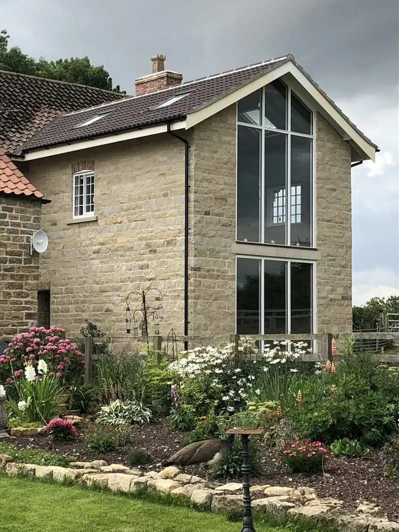 Glazed gable on a stone house