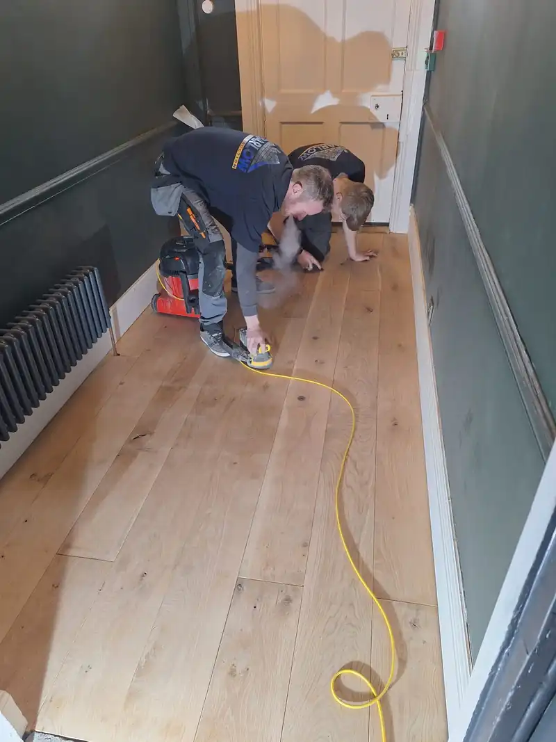 Joiner laying an oak floor