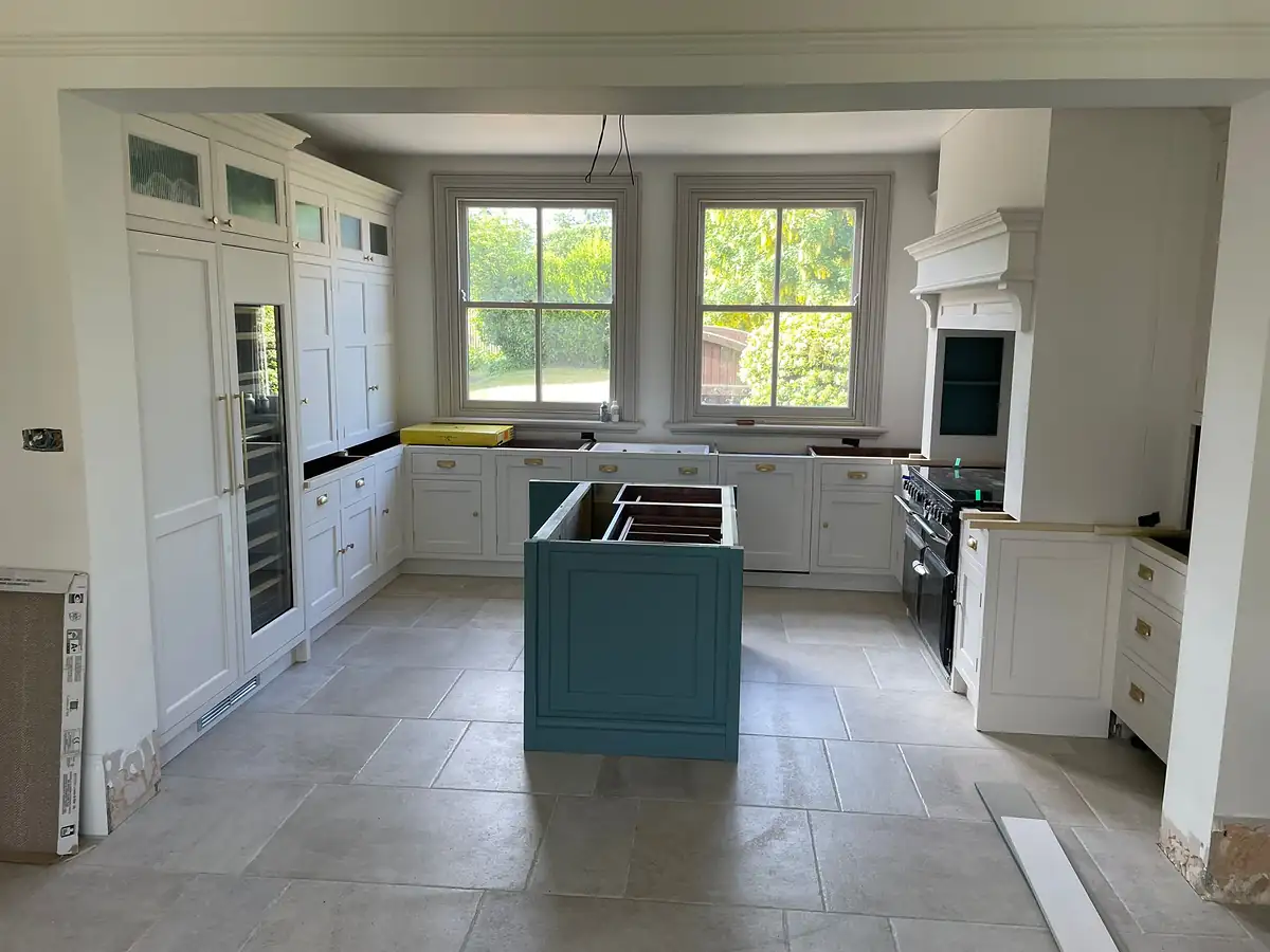 Kitchen with teal island
