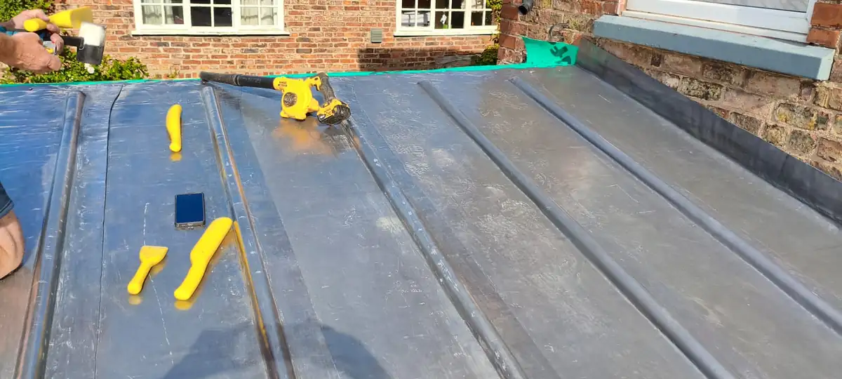 Lead roll roof with tools
