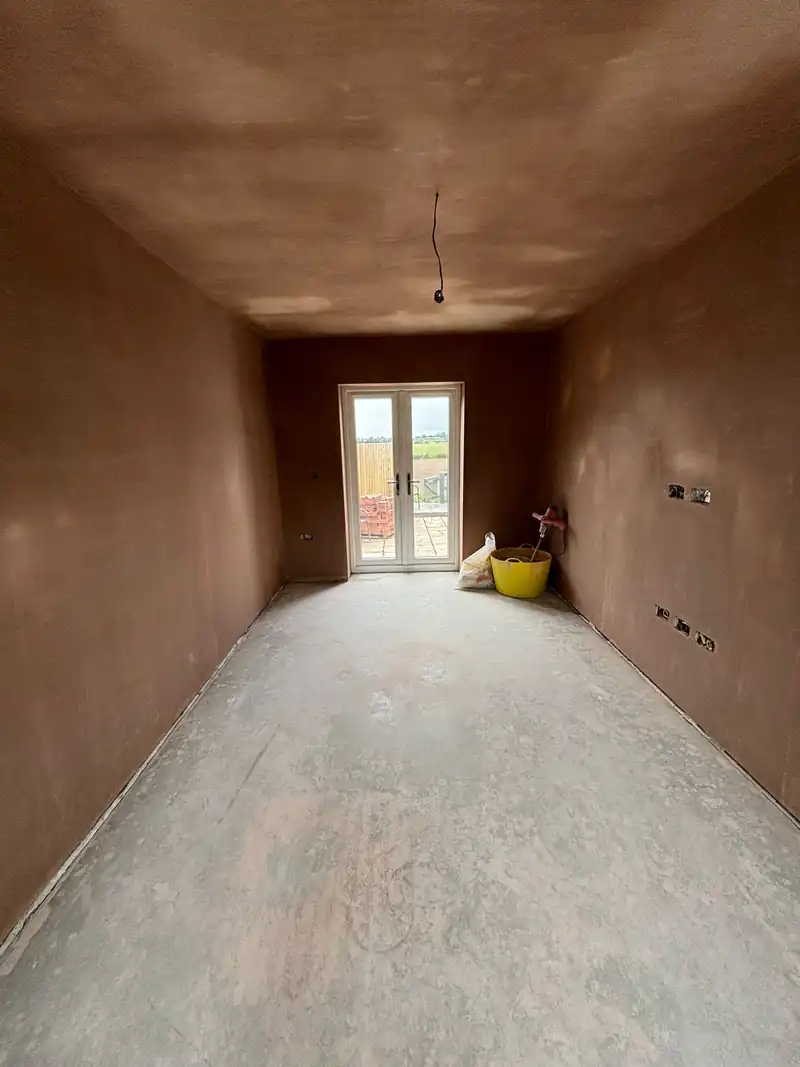 Long room freshly skimmed in plaster