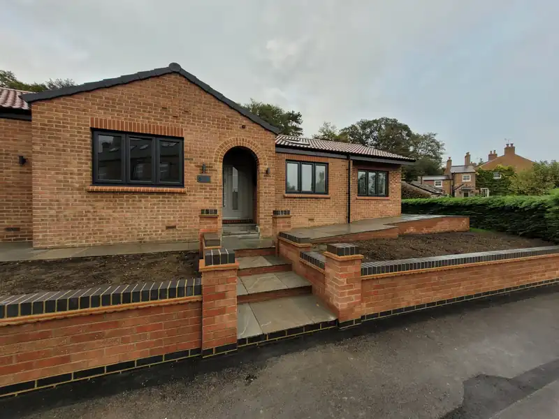 Mallorie Court bungalow in Ripon after the rebuild with new brick walls and steps