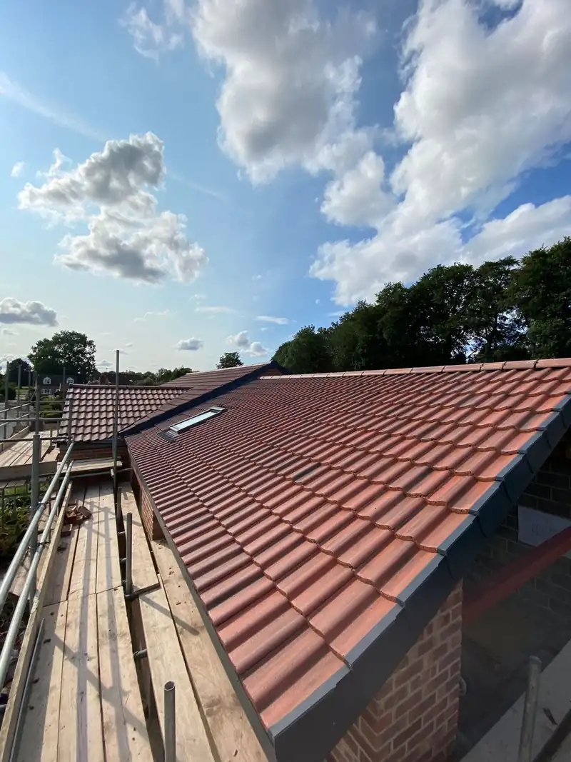New clay tiles on a rebuilt bungalow roof