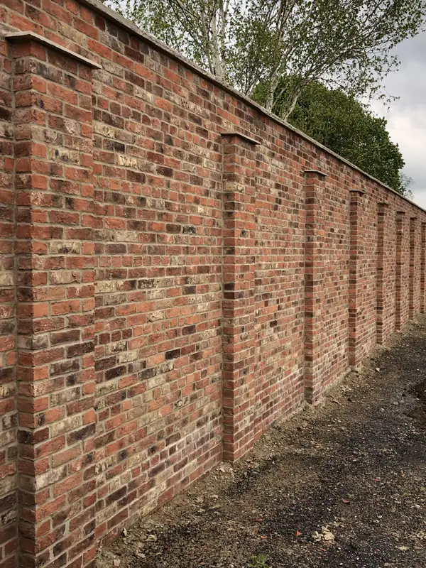 New reclaimed brick garden wall