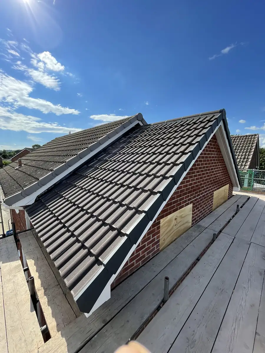 New tiled roof slope on a dormer