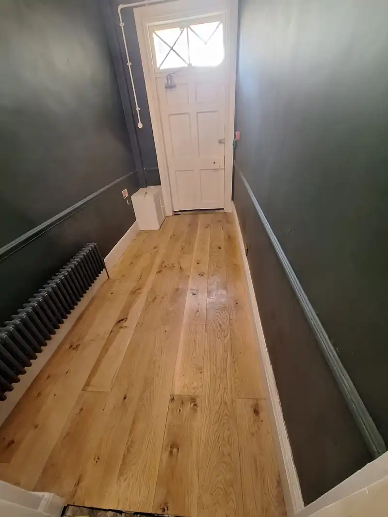 Oak floor running the length of a hallway