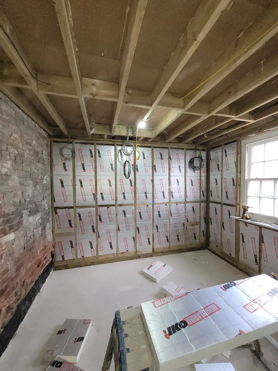Old brick room stripped back and insulated