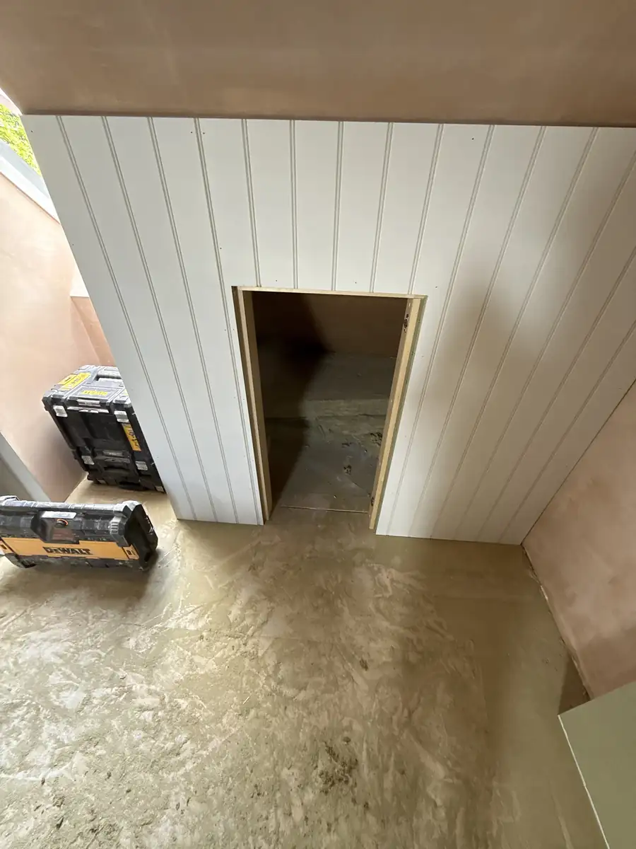 Panelled walls and eaves storage in a loft