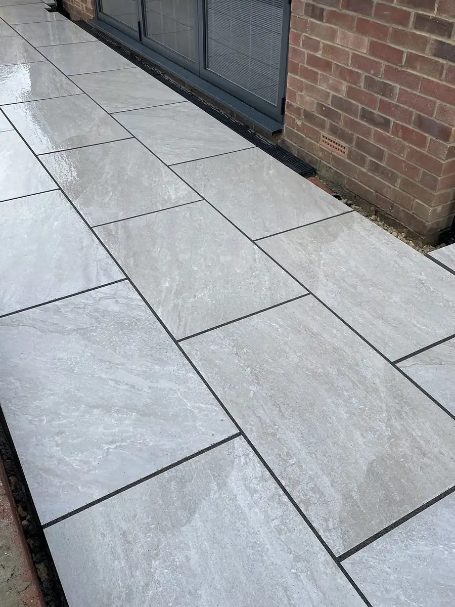 Porcelain patio beside a new extension