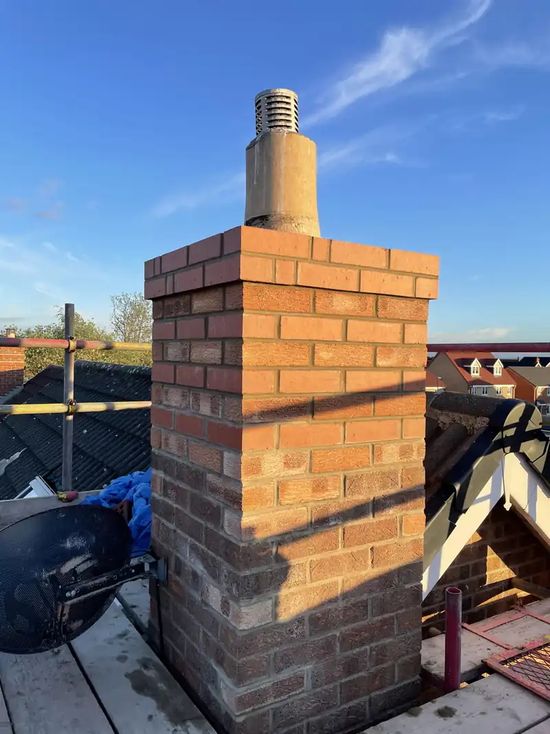 Rebuilt brick chimney stack