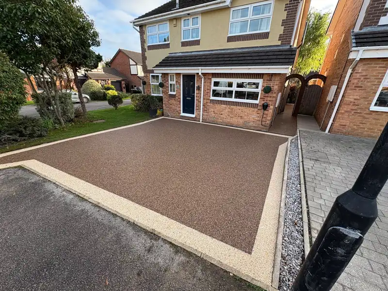 Red resin driveway with light border