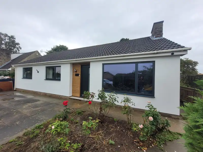 Rendered bungalow and garden