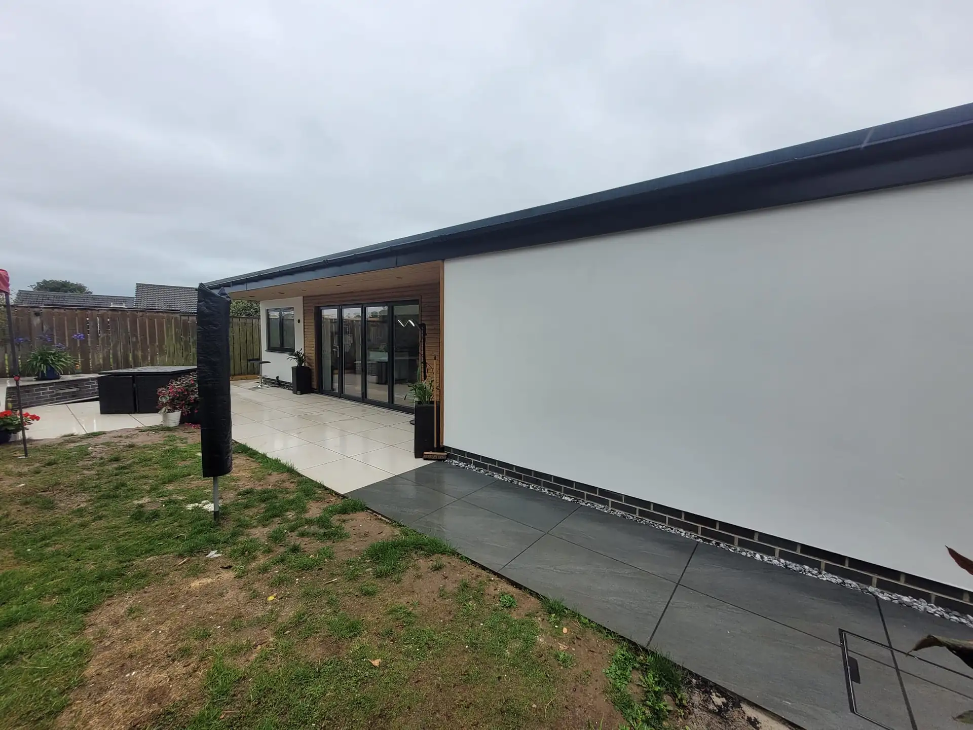 Rendered extension with a porcelain path
