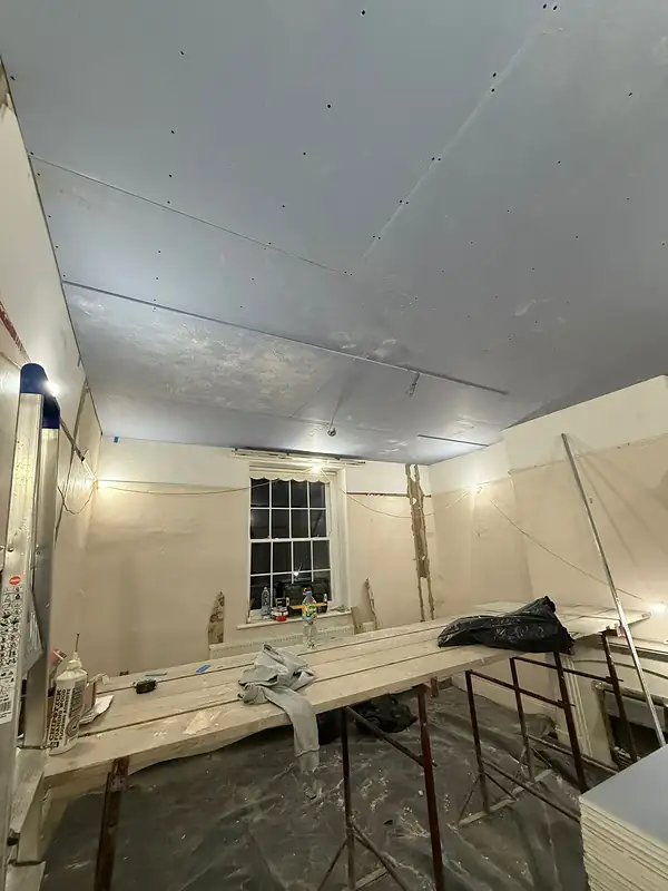 Room being plastered