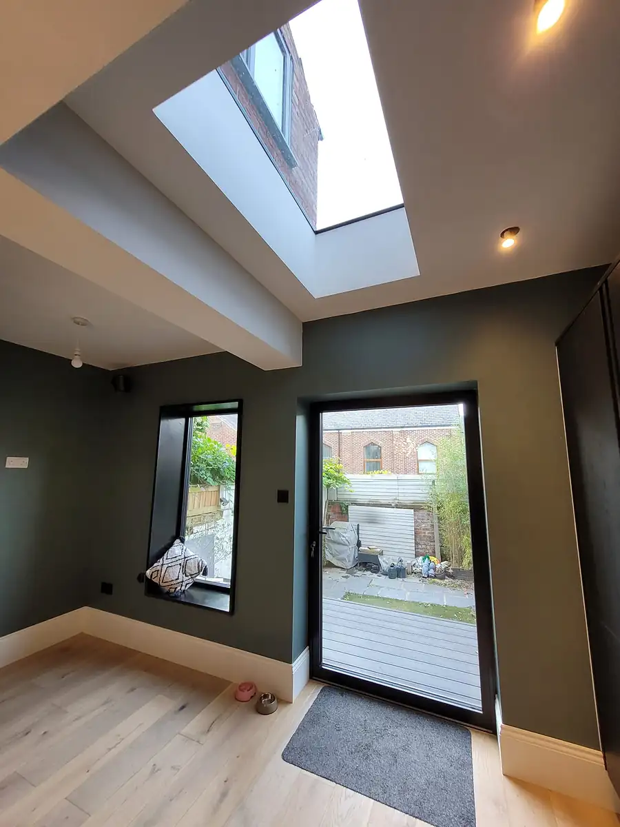 Room with a rooflight and garden door
