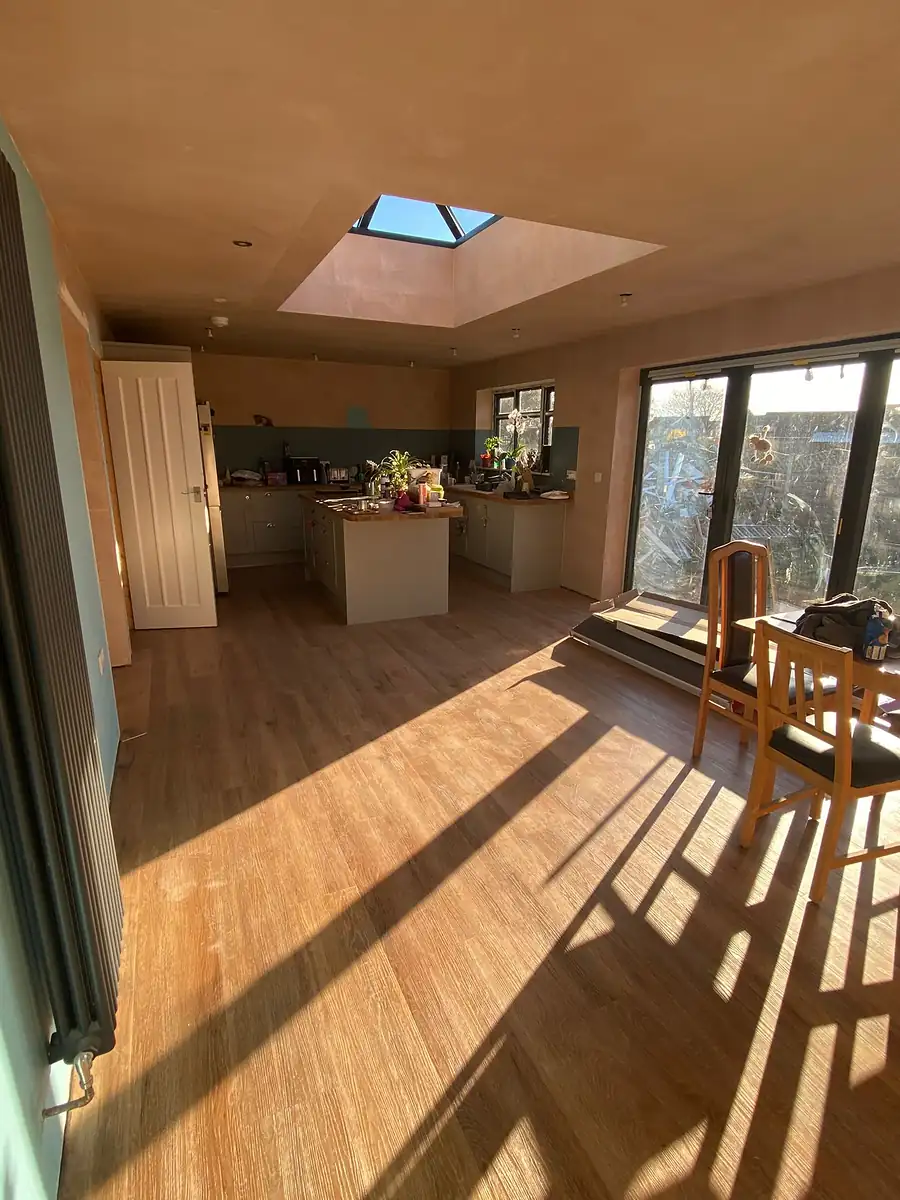 Room with oak floor and rooflight