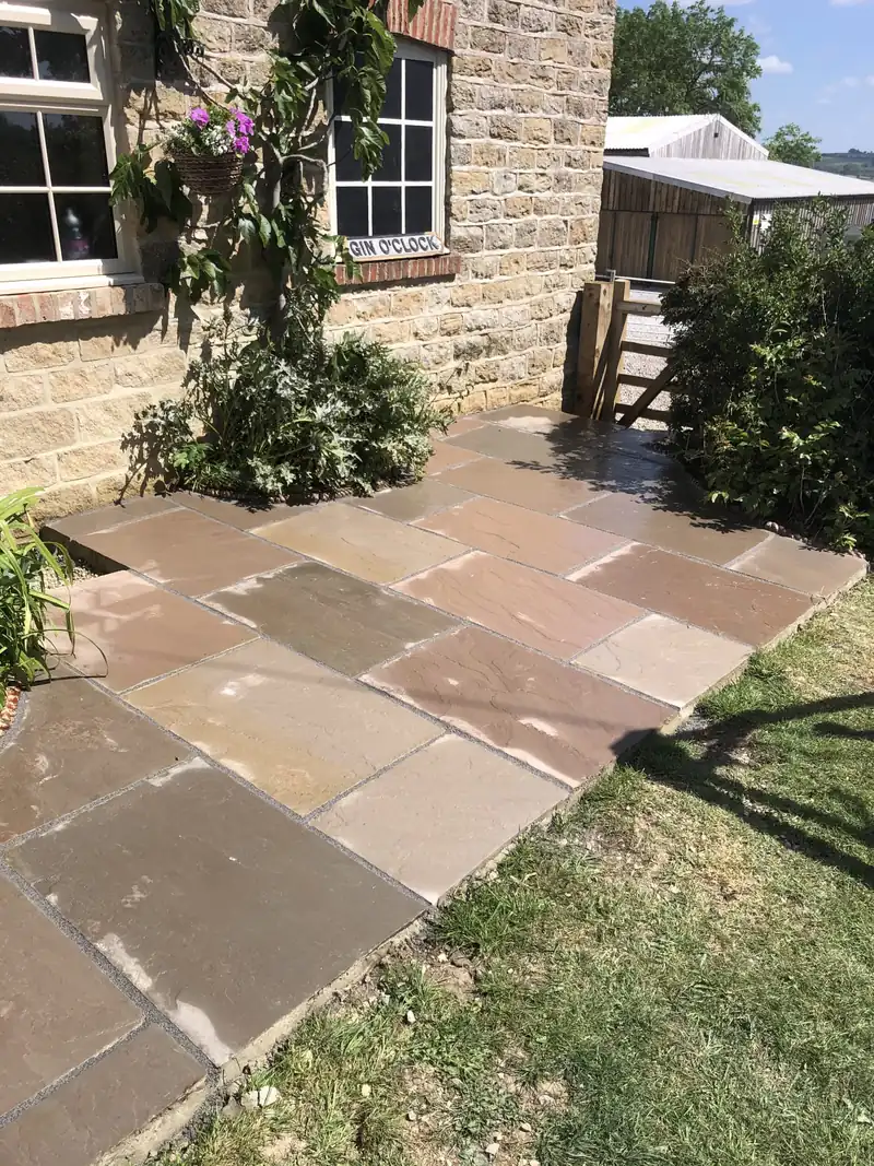 Sandstone path to a cottage door