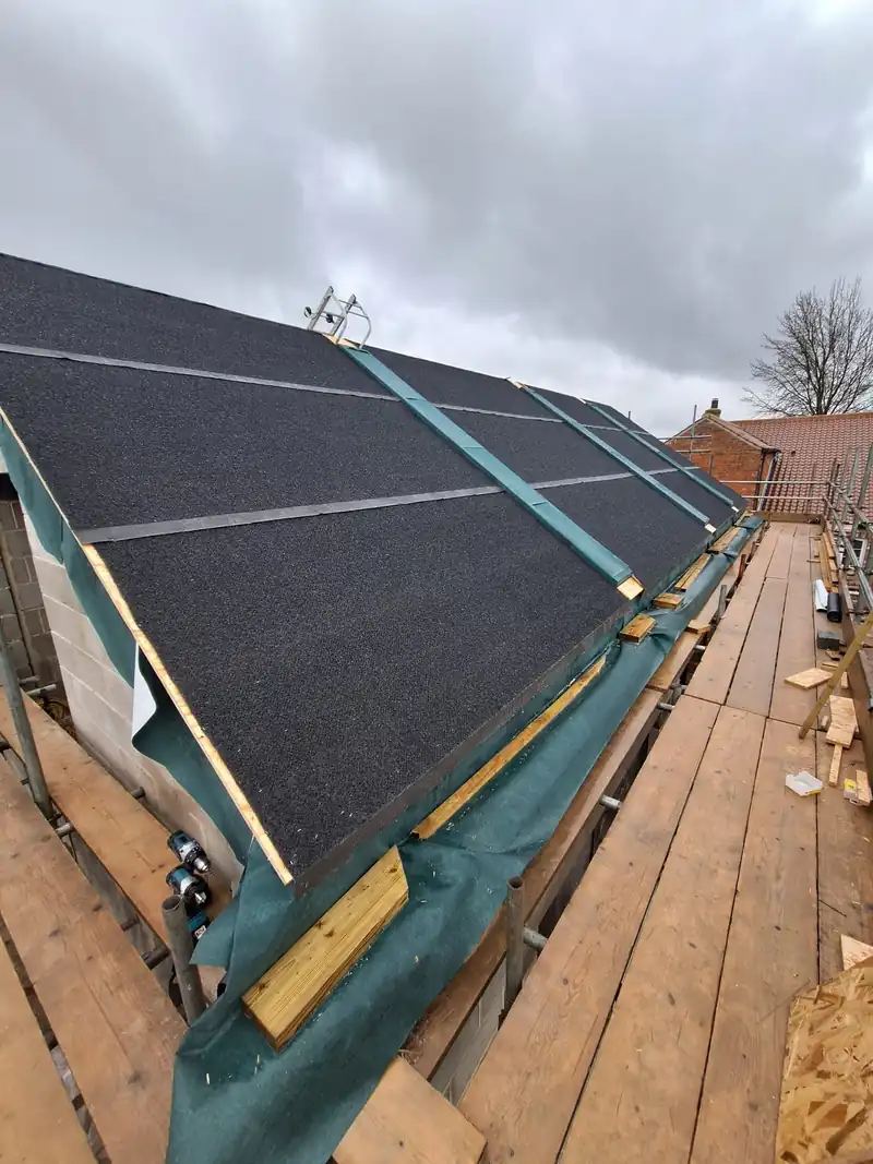 Slate roof with rooflight openings