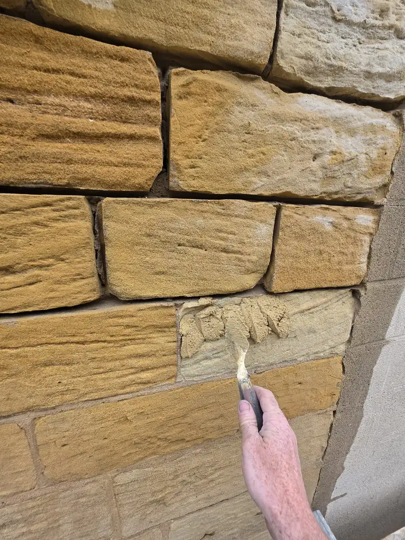 Stone being dressed by hand