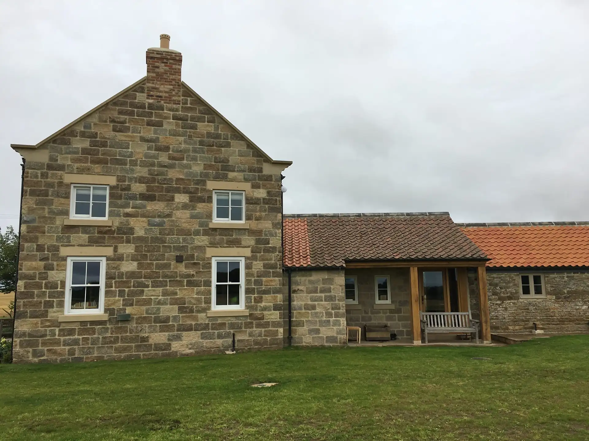 Stone farmhouse with pantile outbuildings