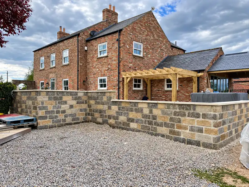Stone farmhouse with rebuilt walls