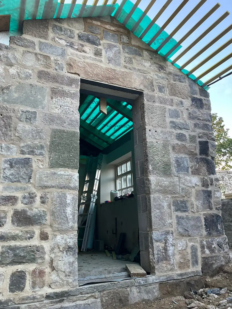 Stone porch rebuilt
